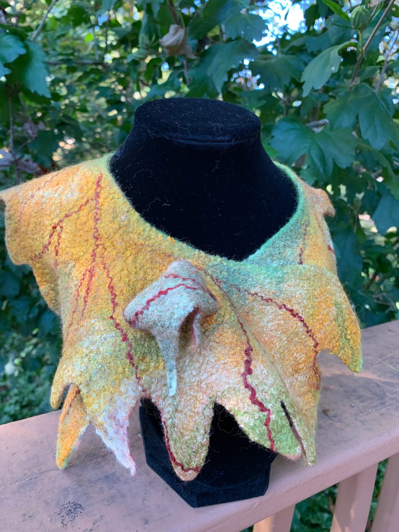 My goal is to create various forms of felt, develop broad possibilities of feltmaking,  and educate the public about the hand made process of felting  using natural fibers and dyes.   My latest work with leather and gemstones is a process of taking a new path in creative process, challenges, and growing.