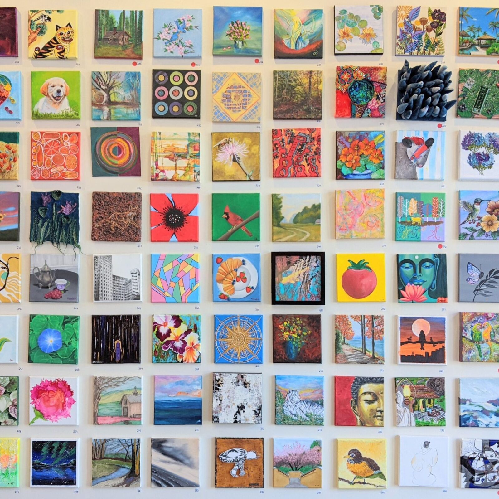 Photo of 8 x 8 pieces of art, part of our GR8 Works art show, open call to artists