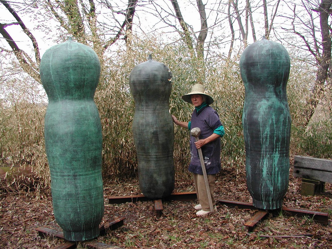 American artist Toshiko Takaezu with her closed form ceramic. 