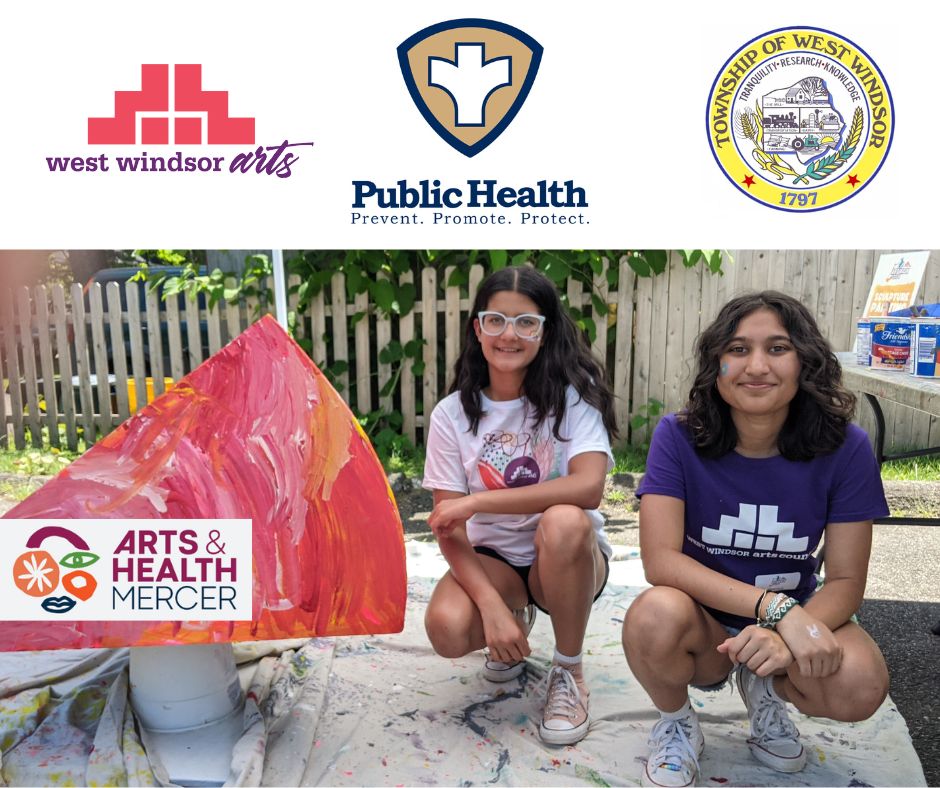 Teens next to public art sculpture